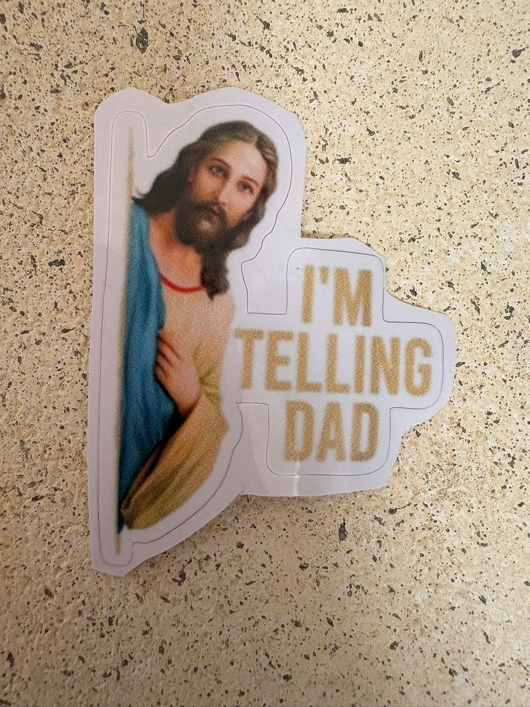 Sticker with Jesus art and text saying “I’m telling dad.”