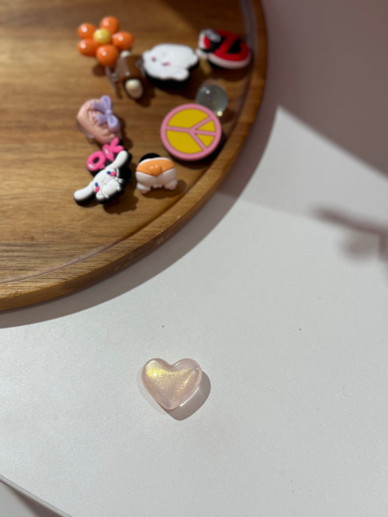Pink heart Croc charm with glitter shimmer.