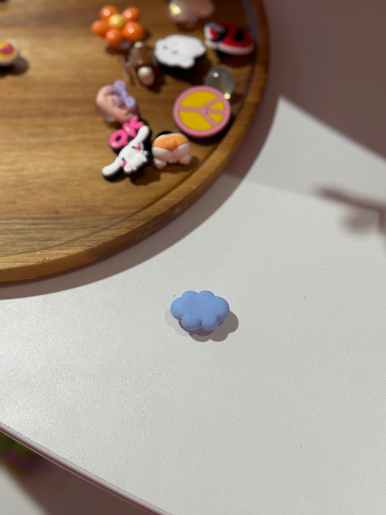 Puffy pastel blue cloud Croc charm.