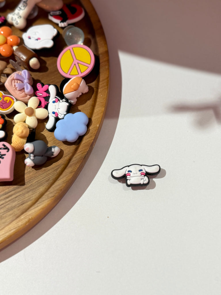 White bunny face Croc charm with pink blush cheeks.