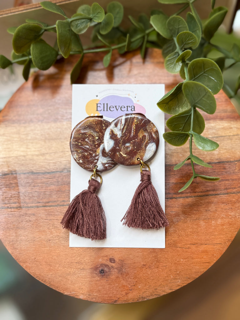 Handmade brown and gold marble effect tassel earrings with fabric tassels.