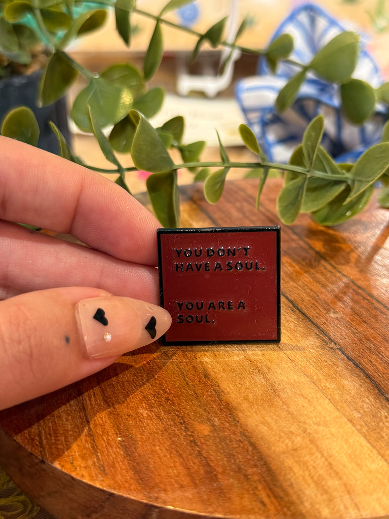 You don’t have a soul, you are a soul quote enamel pin – red and black