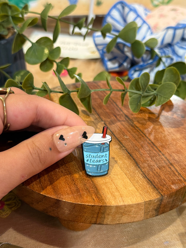 Student Tears enamel pin – blue drink cup with straw