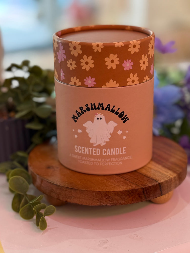 Marshmallow scented candle in floral packaging with illustrated ghost design.