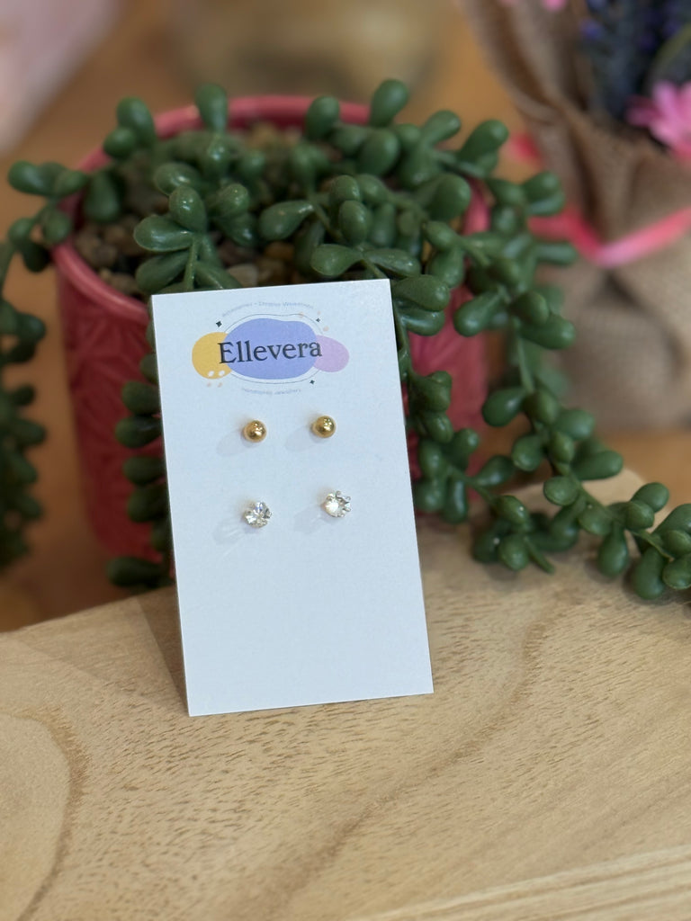Two-pair stud earring set displayed on Ellevera card – one pair of gold ball studs and one pair of crystal studs.