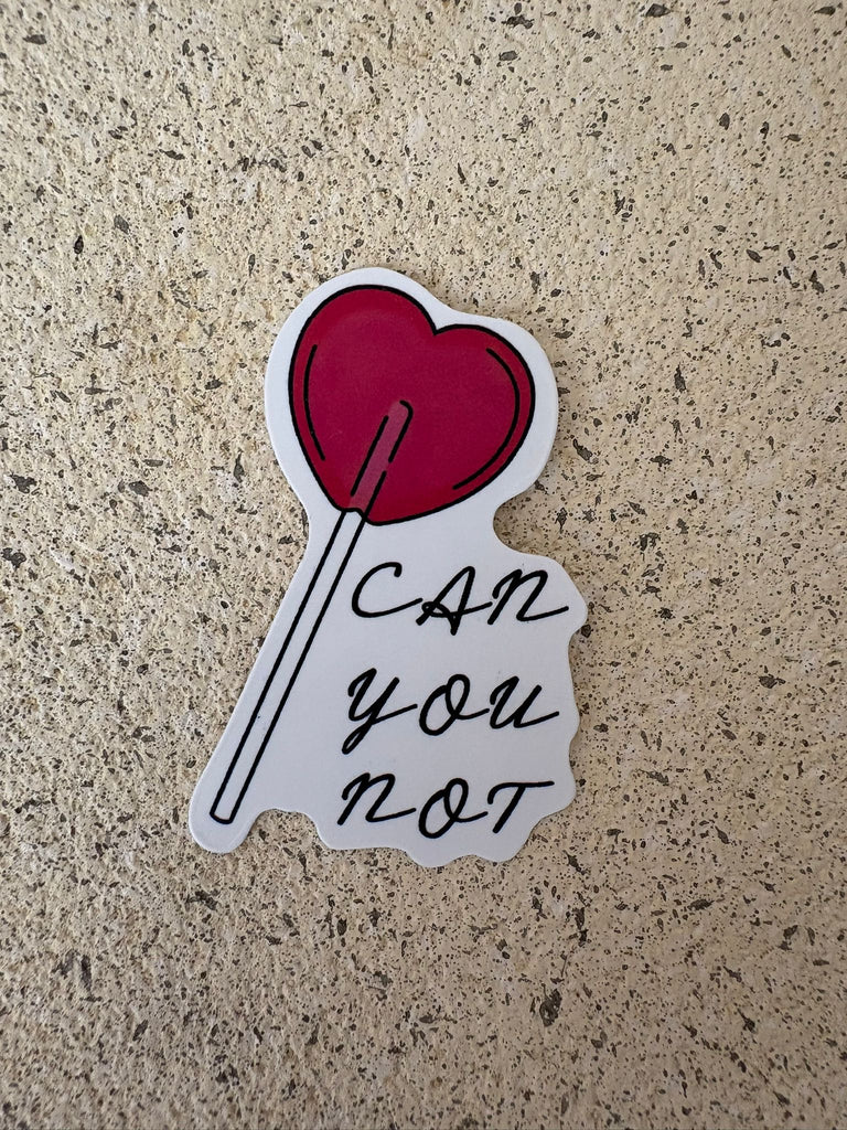 Heart-shaped lollipop sticker with text “Can you not.”